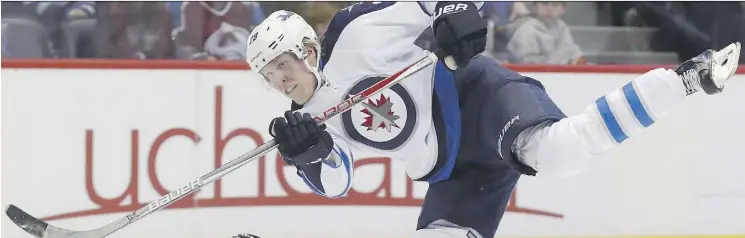  ?? DAVID ZALUBOWSKI/THE CANADIAN PRESS/AP ?? With a deadly one-timer as his primary weapon of choice, Winnipeg Jets rookie forward Patrik Laine has wasted little time making a big splash in the NHL. With 27 goals already, the Finnish standout is on pace for at least 40 goals and could contend to...