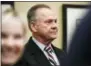  ?? THE ASSOCIATED PRESS ?? Former Alabama Chief Justice and U.S. Senate candidate Roy Moore waits to speak at the Vestavia Hills Public library Saturday in Birmingham, Ala.