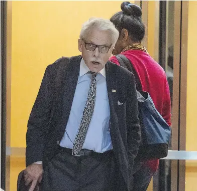  ??  ?? James Regan leaves court in Toronto after a hearing earlier this month. Regan says accusation­s of unpaid rent, furniture and bills at private clubs are inaccurate. PETER J. THOMPSON / NATIONAL POST