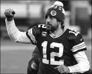  ?? (Stacy Revere/Getty Images/TNS) ?? Aaron Rodgers #12 of the Green Bay Packers leaves the field following the NFC Divisional Playoff game against the Los Angeles Rams at Lambeau Field on Jan. 16, 2021 in Green Bay, Wisconsin. The Packers defeated the Rams 32-18.