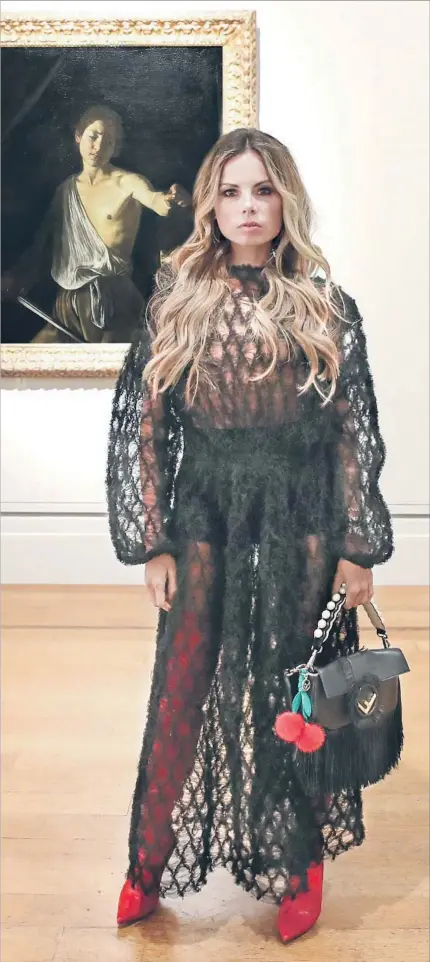  ?? Jonathan Leibson BFA.com ?? STYLIST Erica Pelosini rocks Fendi at the Getty Center’s preview of “Caravaggio: Masterpiec­es from the Galleria Borghese.”