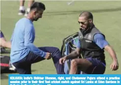  ??  ?? KOLKATA: India’s Shikhar Dhawan, right, and Cheteswar Pujara attend a practice session prior to their first Test cricket match against Sri Lanka at Eden Gardens in Kolkata, India, yesterday. — AP