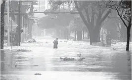  ??  ?? Brickell Avenue in Miami was flooded after Hurricane Irma.