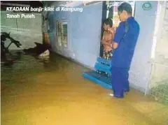  ??  ?? KEADAAN banjir kilat di Kampung Tanah Puteh.