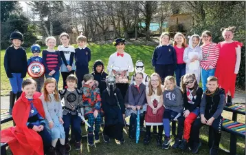  ??  ?? Ms Seoighe with 2nd class at World Book Day at St Mary & St Gerard’s NS, Enniskerry.