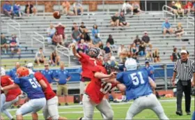  ?? SAM STEWART — DIGITAL FIRST MEDIA ?? Upper Perkiomen’s Zeke Hallman throws a pass to Justin Jaworski during the first half.