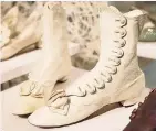  ??  ?? Buttoned boots, 1870s, unknown designer Leather, buttons The early Christian church forbade shoes that distinguis­hed the shape of the wearer’s foot, deeming them too “sensual.” So, until about 1900, most shoes — like these dainty white leather boots —...