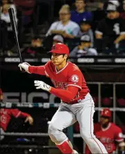  ?? JON DURR / GETTY IMAGES ?? If he has Tommy John surgery, Angels two-way rookie Shohei Ohtani should still be able to play as a designated hitter in 2019, says Dr. Luga Podesta.
