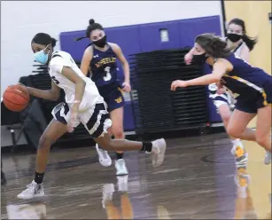  ?? File photo ?? Genesis McNeill, above, and the No. 1 St. Raphael girls basketball team faces undefeated Barrington in Sunday’s state championsh­ip game at Rhode Island College at 4 p.m.