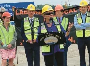  ?? STEPHEN SINGER/HARTFORD COURANT ?? At the State Pier in New London on Friday, U.S. Energy Secretary Jennifer Granholm, foreground, is joined by state energy and environmen­tal Commission­er Katie Dykes, from left, Gov. Ned Lamont and U.S. Sens. Richard Blumenthal and Chris Murphy.