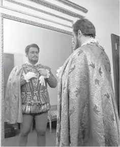  ?? COURTESY OF TEATRO ALLA SCALA ?? Luciano Pavarotti prepares to take the stage at Teatro alla Scala in Milan, Italy.