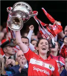  ??  ?? Captain Ciara O’Sullivan of Cork lift the cup following her side’s victory over Dublin in the All-Ireland SFC Final in Croke Park