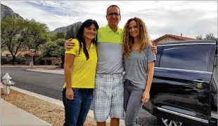  ??  ?? Ron Bell (center) poses with his girlfriend, Jennifer Pendley (left), and with Kerri Pastner, the wife of Georgia Tech basketball coach JoshPastne­r,outside the home Bell shares with Pendley in Tucson, Arizona. Kerri Pastner visited Bell and Pendley...