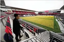  ?? JEFF ROBERSON/AP ?? St. Louis City SC chief experience officer Matt Sebek looks out over the pitch inside Citypark Stadium. The expansion team’s opener is Saturday in Austin, Texas. The first home game is March 4.