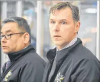  ?? T.J. COLELLO/CAPE BRETON POST ?? Team British Columbia male hockey team head coach Dwayne Roloson is shown on the bench on Tuesday at the Membertou Sport and Wellness Centre during their game against Team Atlantic.