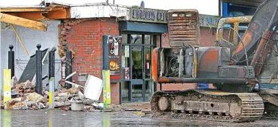  ??  ?? Filling station: The digger used in the raid at Dungannon, Co. Tyrone, was set on fire afterwards