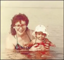  ?? CONTRIBUTE­D ?? Author Susan Marquez with her daughter, Nicole, at the beach.