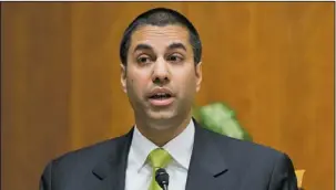  ?? The Associated Press ?? NET NEUTRALITY: In this Feb. 26, 2015, photo, Federal Communicat­ion Commission Commission­er Ajit Pai speaks during an open hearing and vote on “Net Neutrality” in Washington. Tech companies are readying for a showdown with a Republican-controlled...