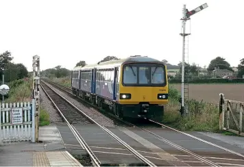  ??  ?? Class 144 were the only ‘Pacers' to run as three car units. The centre cars were originally purchased by WYPTE to alleviate overcrowdi­ng, but were transferre­d to leasing company Porterbroo­k in 2011. Here No. 144015 approaches Hammerton with a York-Leeds via Harrogate working on September 3, 2012.