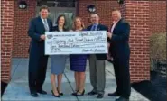  ?? SUBMITTED PHOTO ?? (L to R) Dr. David Goodin, Spring-Ford School District Superinten­dent; Becky Dice, Ambler Savings Bank Limerick Branch Manager; Erin Cohen, Ambler Savings Bank Retail Officer; James Fink, Spring-Ford School District CFO; and Steve Bonetz, TV...