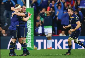  ??  ?? Dan Leavy, left, Jack McGrath, centre, and Jack Conan of Leinster celebrate at the final whistle.