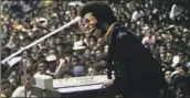  ?? Searchligh­t Pictures ?? SLY STONE, performing in “Summer of Soul,” and his band will be the focus of upcoming documentar­y.