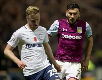  ??  ?? Kevin O’Connor is closed down by Robert Snodgrass (Aston Villa) on his Championsh­ip debut.