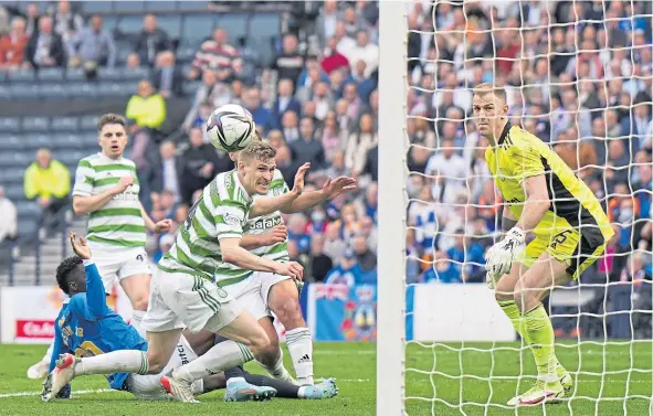  ?? ?? Agony for Celtic’s Carl Starfelt as his own-goal in extra time gives Rangers a 2-1 win over their arch-rivals in the semi-finals of the Scottish Cup.