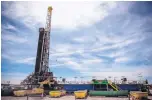  ?? ROBERTO E. ROSALES/ JOURNAL ?? An oil well drilling operation near Jal in southeaste­rn New Mexico is one of many contributi­ng to the U.S.’ surging crude oil output.