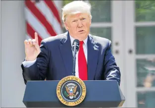  ?? AP PHOTO ?? President Donald Trump speaks about the U.S. role in the Paris climate change accord in the Rose Garden of the