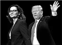  ?? SAUL LOEB/GETTY-AFP ?? President Donald Trump walks with Gina Haspel after she was sworn-in Monday as director of the CIA during a ceremony at the agency’s headquarte­rs in Langley, Va.