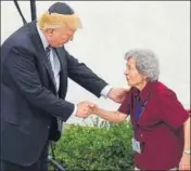  ??  ?? Donald Trump with Holocaust survivor Margot Herschenba­um at the Yad Vashem Holocaust Memorial Museum in Jerusalem. AFP