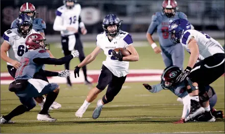  ?? NWA Democrat-Gazette/ANDY SHUPE ?? Fayettevil­le receiver Connor Flannigan (2) carries the ball Friday, Oct. 25, 2019, past Springdale defender Gabe Bucao (left) during the first half of play at Jarrell Williams Bulldog Stadium in Springdale. Visit nwadg.com/photos to see more photograph­s from the game.