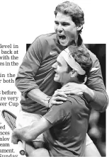  ??  ?? Roger Federer and Rafael Nadal of team Europe celebrate after winning the match. — Reuters photo