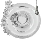  ??  ?? Arthur Court Designs “Dogwood” chip and dip server, $149; Bed Bath & Beyond