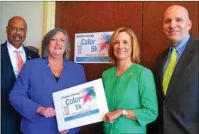  ?? SUBMITTED PHOTO ?? Chester County Commission­ers Terence Farrell (from left), Kathi Cozzone and Michelle Kichline, with Chester County District Attorney Tom Hogan announcing the Chester County Color 5k to raise funds to fight opioid and heroin addiction.