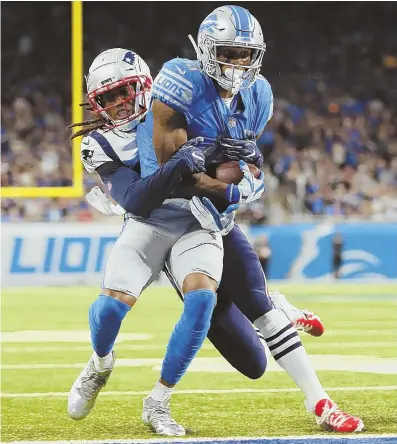  ?? STAFF PHOTO BY NANCY LANE ?? UGLY NIGHT: Stephon Gilmore can’t stop Kenny Golladay from scoring a touchdown in the second quarter of the Patriots’ 26-10 loss to the Lions last night in Detroit.