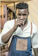  ?? ?? CONTINENTA­L CHAMPION: SA mixologist Thabiso Molonyama has won the Africa section of the Johnnie Walker Global Bartender Challenge