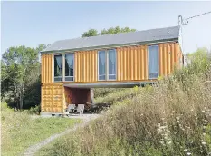  ??  ?? “Before, containers were mainly for low-income or disaster-relief housing,” says John Nafziger, the co-founder of architectu­re and design firm Bigprototy­pe. But now, he says, the homes are “great eye candy on the block.”