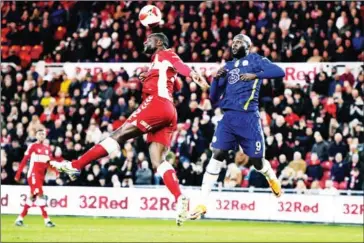  ?? AFP ?? Middlesbro­ugh defender Sol Bamba (centre) vies with Chelsea striker Romelu Lukaku during the English FA cup quarter-final football match on Saturday.