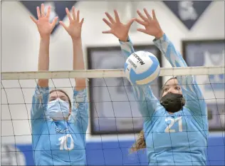  ?? Dan Watson/The Signal ?? Saugus defenders Milani Lee (10) and Shelby Scott (21) block a shot by Archer School For Girls at Saugus on Thursday.