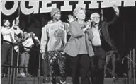  ??  ?? Hillary Clinton takes the stage with musician Pharrell Williams and Senator Bernie Sanders at a campaign rally in Raleigh, North Carolina.(Photo: Reuters)