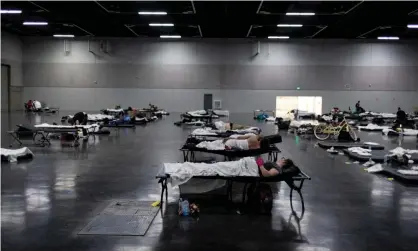  ?? Photograph: Maranie Staab/ Reuters ?? People sleep at a cooling shelter set up during an unpreceden­ted heatwave in Portland, Oregon, 27 June.