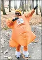  ?? JESI YOST — FOR MEDIANEWS GROUP ?? Helen Fortini of Gilbertsvi­lle ran the Turkey Trot 5K in her inflatable roast turkey costume.