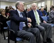  ?? Arkansas Democrat-Gazette/STATON BREIDENTHA­L ?? Walter E. Hussman Jr., chairman of WEHCO Media, Inc., the parent company of the Arkansas Democrat-Gazette, shakes hands with Sheffield Nelson on Tuesday after speaking at a news conference where Nelson announced Hussman as the Easterseal­s Arkansas 2019 Arkansan of the Year. Nelson is chairman of the 2019 Arkansan of the Year Committee.