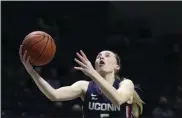  ?? GARY LANDERS - FREELANCER, AP ?? UConn guard Paige Bueckers (5) shoots against Xavier during the first half of an NCAA college basketball game in Cincinnati, in this Saturday, Feb. 20, 2021, file photo.