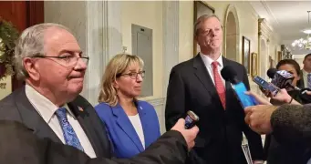  ?? ANGELA ROWLINGS / HERALD STAFF FILE ?? HOLDING THEIR GROUND: House Speaker Robert DeLeo, right, Senate President Karen Spilka and Gov. Charlie Baker speak to reporters last month. Both DeLeo and Baker support the use of nondisclos­ure agreements in sexual misconduct cases but a bill to ban the agreements is making its way through the legislatur­e.