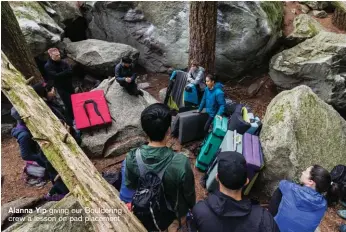  ??  ?? Alanna Yip giving our Bouldering crew a lesson on pad placement