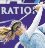  ?? Ringo H.W. Chiu The Associated Press ?? Brooke Henderson follows through on a shot from the 17th tee Saturday in the third round of the ANA Inspiratio­n at Mission Hills Country Club.