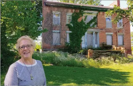  ?? BETSY SCOTT — THE NEWS-HERALD ?? Perry Township Park Manager Charlotte Kline has fond memories of the Parmly/Lorimer home when it was part of Camp Roosevelt. The township acquired it after Bill Lorimer died.